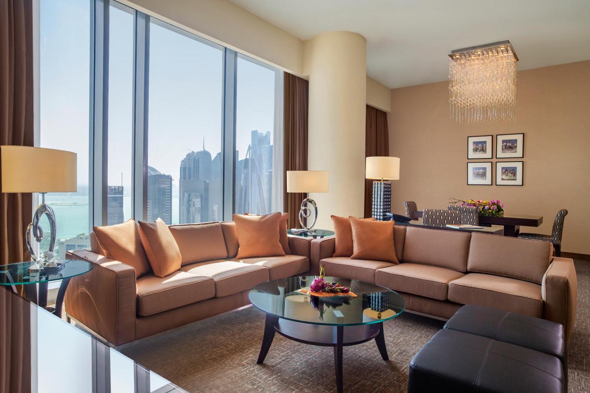 City Centre Rotana Doha Luaran gambar A living room in a suite at the Ritz-Carlton, DIFC